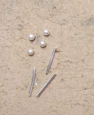 Judy Larson's Split Bead Earrings - Making Decorative Balls for Embellishment, Contemporary Wire Jewelry, Filing, Finishing, , sanding, filing, polishing, Space the cut pieces of wire out on a soldering brick.